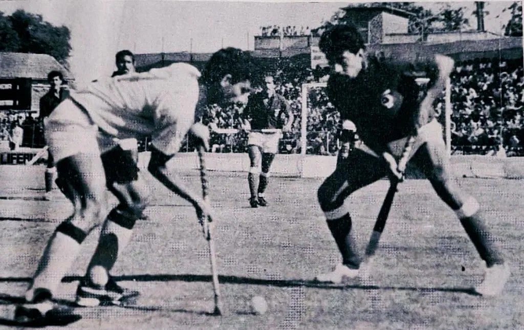 MM Somaya (left) works his way during playing days