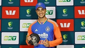 Abhishek Sharma with his Man of the Series trophy in Australia