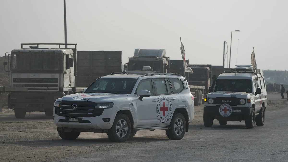 A Red Cross convoy transports an Israeli soldier’s remains to the Gaza-Israel border.
