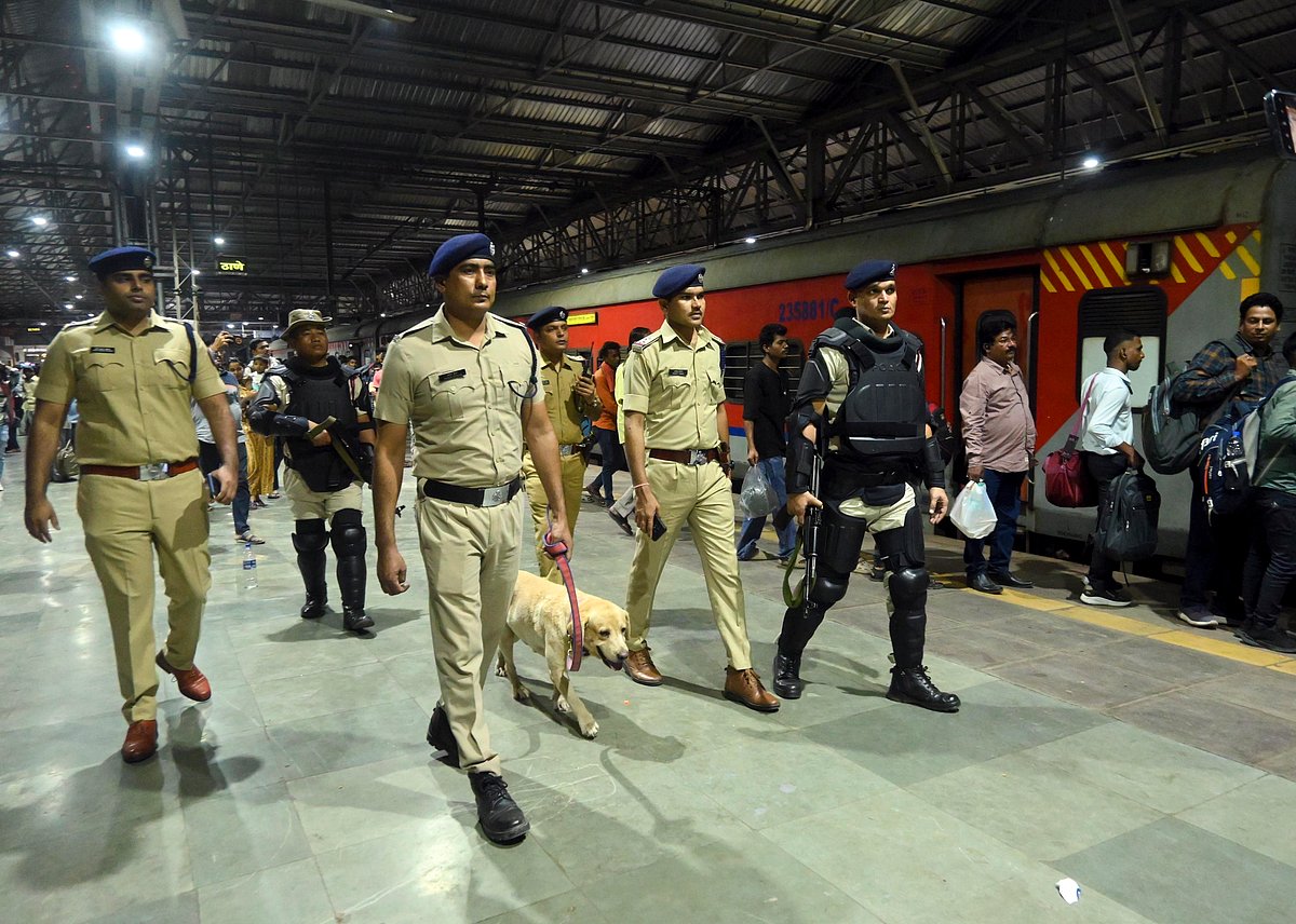 A bomb disposal squad checks the premises of Chhatrapati Shivaji Maharaj Terminus in Mumbai