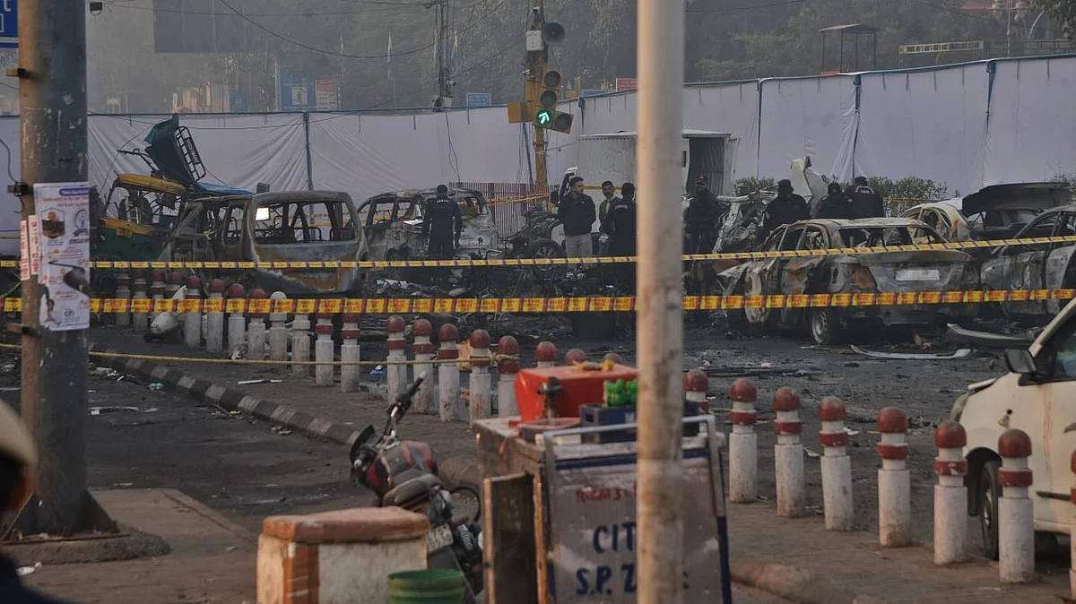 Delhi Police comb blast site near Red Fort for clues.
