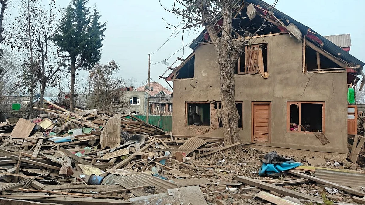 Debris lies scattered after security forces demolish the house of Dr Umar Nabi in Pulwama.