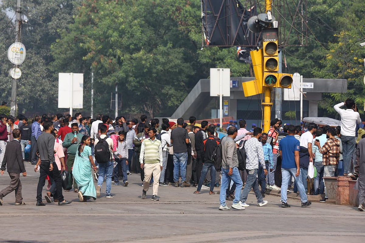 Commuters enter the Red Fort Metro station on Saturday, 15 Nov 2025