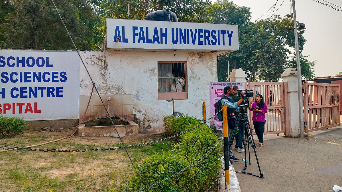 Media persons outside the Al Falah University in Faridabad.