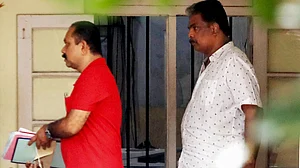 File photo of ex-Sabarimala administrative officer B. Murari Babu (in white), arrested in October