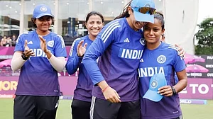 Uma Chetry (right) being handed her ODI debut cap by Smriti Mandhana during last World Cup