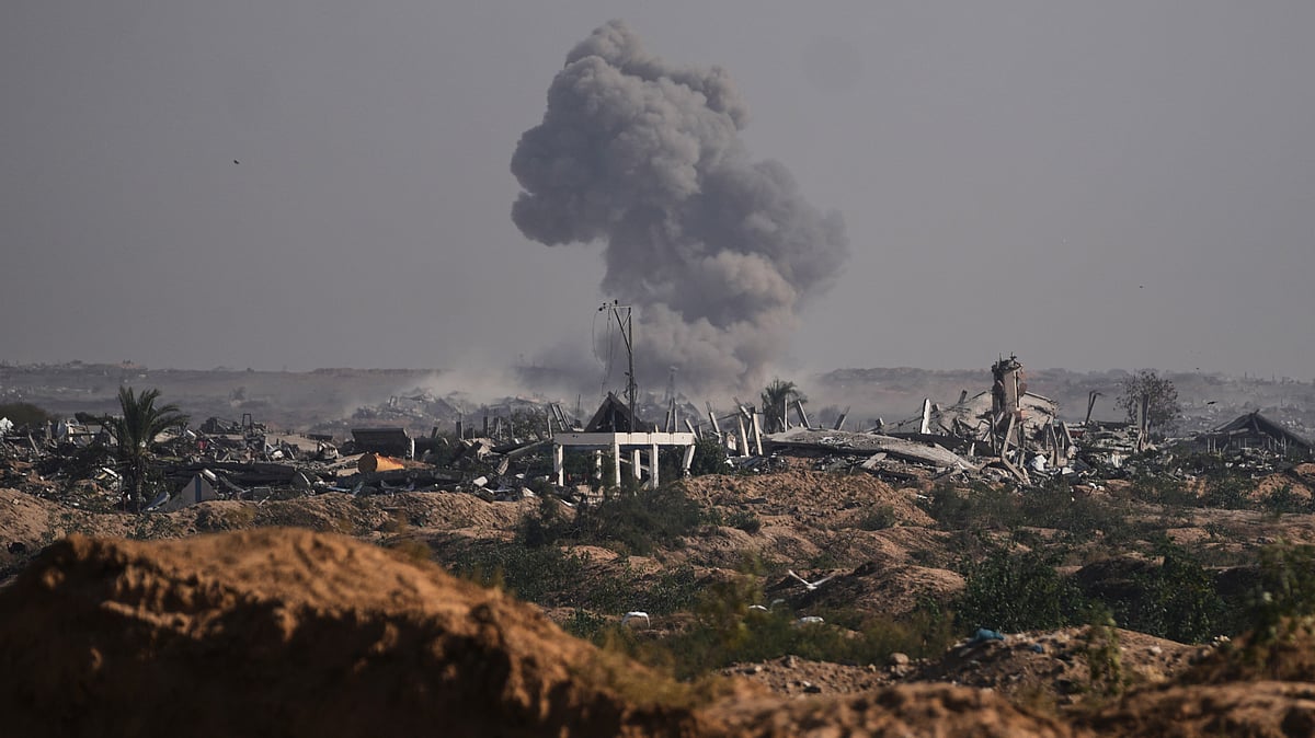 Smoke rises after an Israeli strike east of Nuseirat, seen from central Gaza.