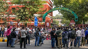 Protesters demonstrating outside St Columba's School