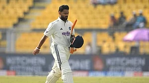 Rishabh Pant walks back after his dismissal in Guwahati