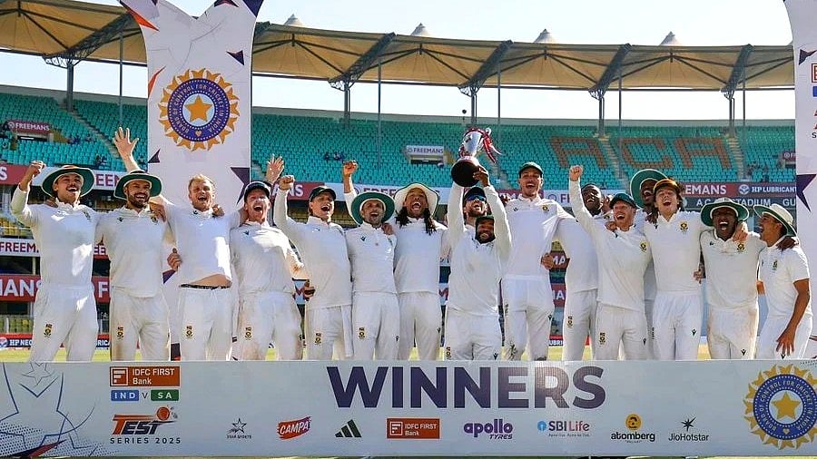 The Proteas with the series winners' trophy in Guwahati