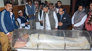 Mourners gather at Sriprakash Jaiswal’s Kanpur residence.