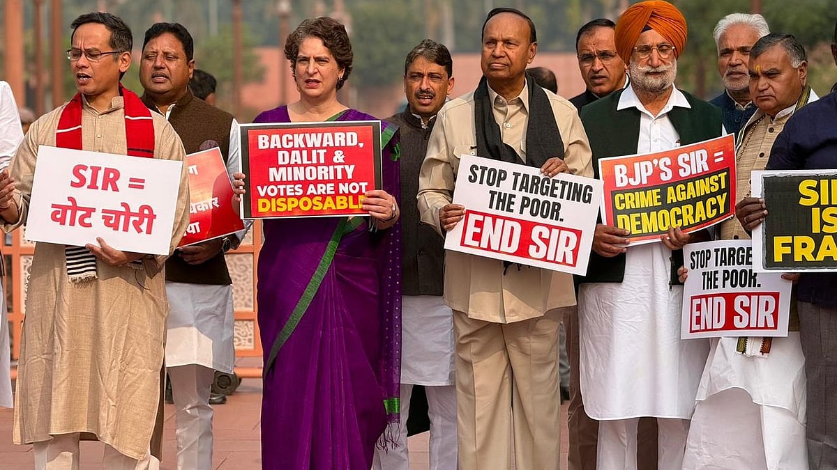 Priyanka Gandhi Vadra with other Congress leaders protest outside Parliament.