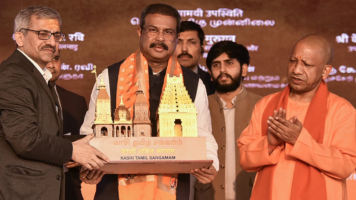 Dharmendra Pradhan (C) and UP CM Yogi Adityanath (R) at Kashi Tamil Sangamam, in Varanasi