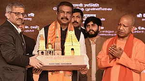Dharmendra Pradhan (C) and UP CM Yogi Adityanath (R) at Kashi Tamil Sangamam, in Varanasi
