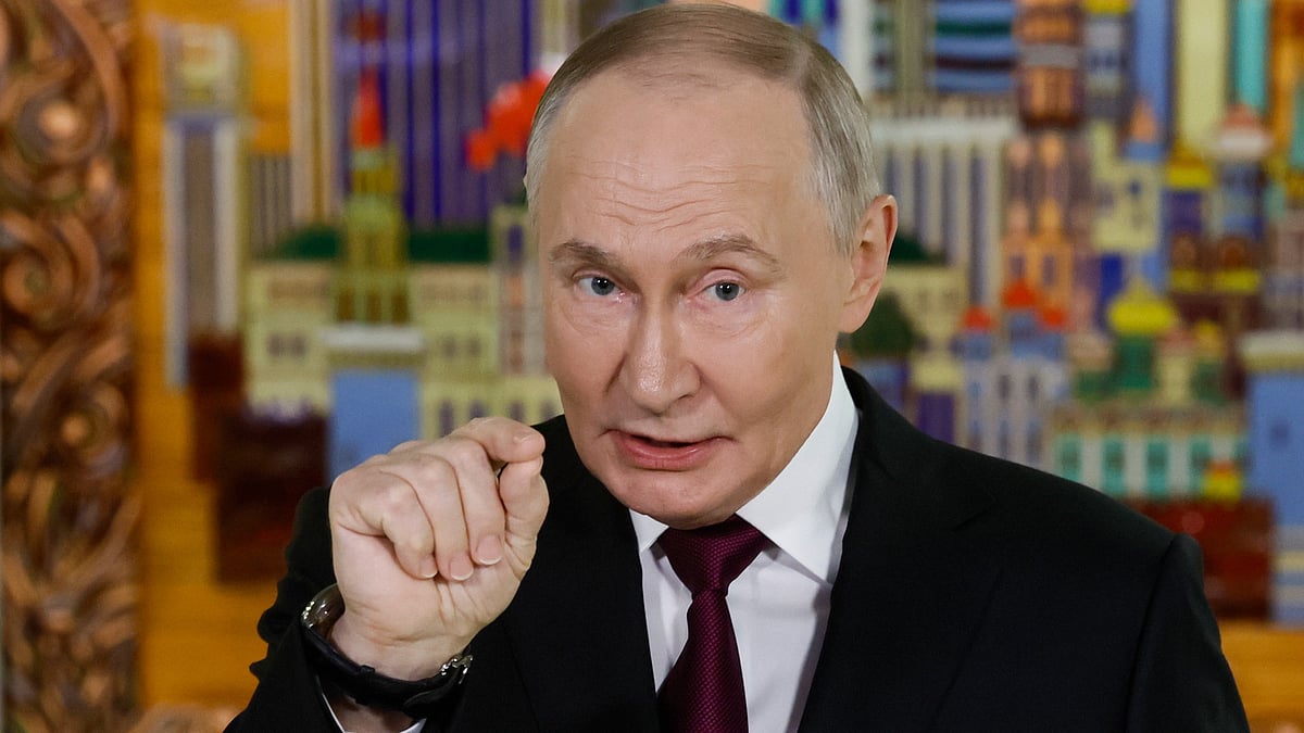 Vladimir Putin addresses journalists in Moscow.