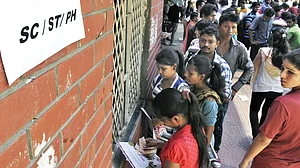 Students seeking admission in Delhi University submit their application forms