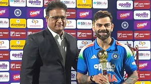 Virat Kohli with Man of the Series trophy in Vizag on Saturday