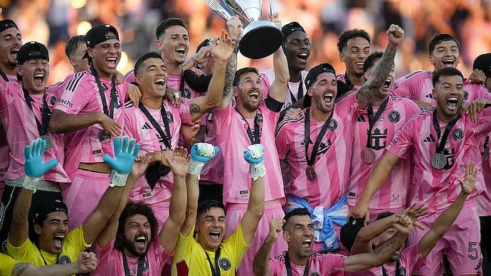 Lionel Messi and his Inter Miami teammates with the MLS Cup.