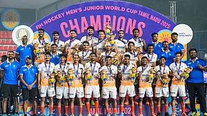 India team, with head coach P.R.Sreejesh (extreme left, front row) after receiving their medals