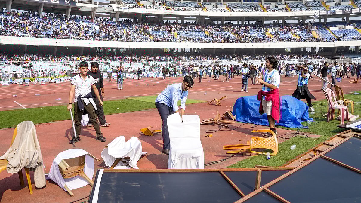 Chairs and banners being vandalised at Vivekananda Yuba Bharati Krirangan in Kolkata.