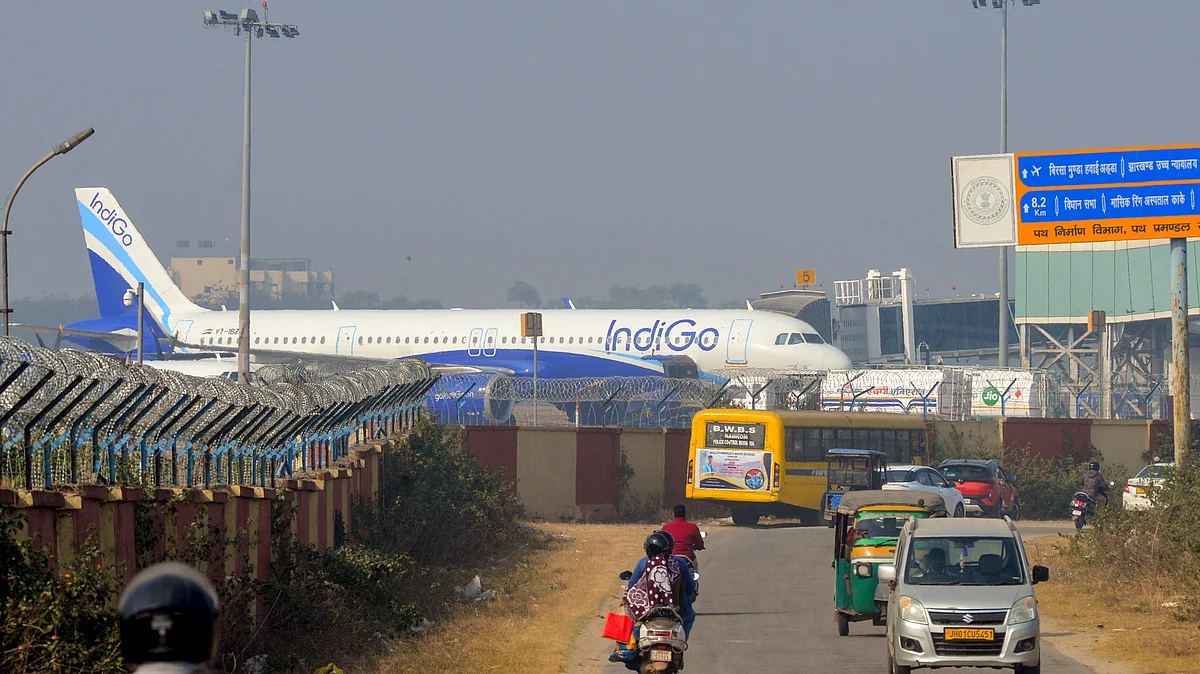An IndiGo aircraft stands as some flights face delays due to the IndiGo operational crisis.