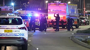 Police cordon off part of Bondi Beach following a reported shooting in Sydney.