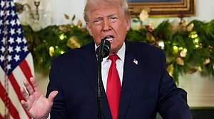 Donald Trump speaks during an address at the White House.