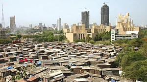 These chawls and highrises in the same frame hold a mirror to our growth model. (NH Archives)