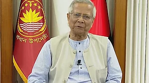 Muhammad Yunus speaks via a televised address in Dhaka.