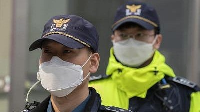 South Korean and Cambodian police at a site in Mondulkiri province