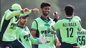 Jubilant Pakistan team members at the fall of a Indian wicket on Sunday