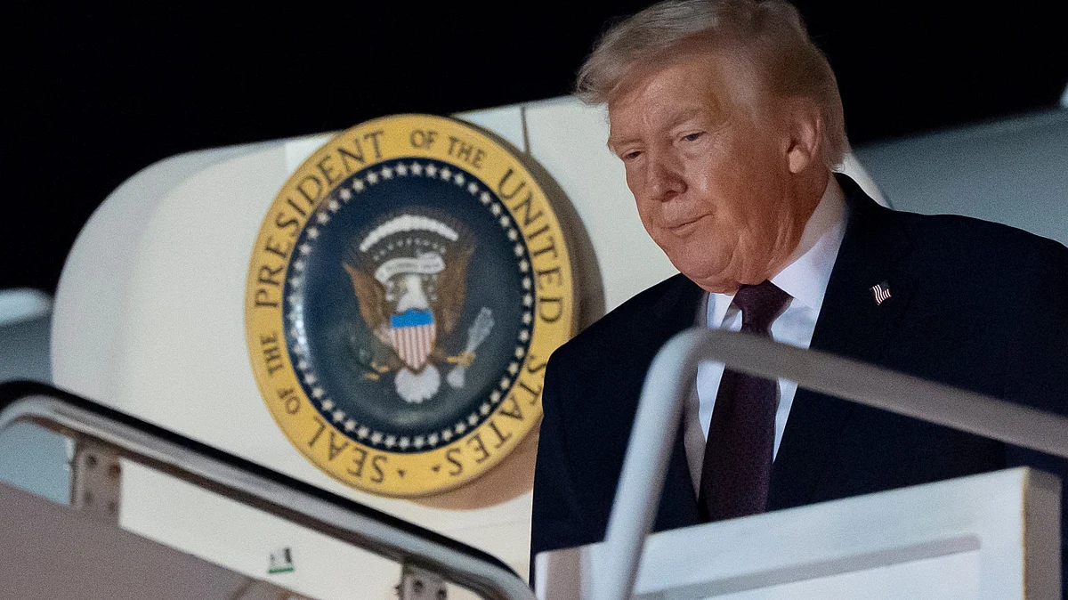 Donald Trump arrives on Air Force One at Palm Beach International Airport.
