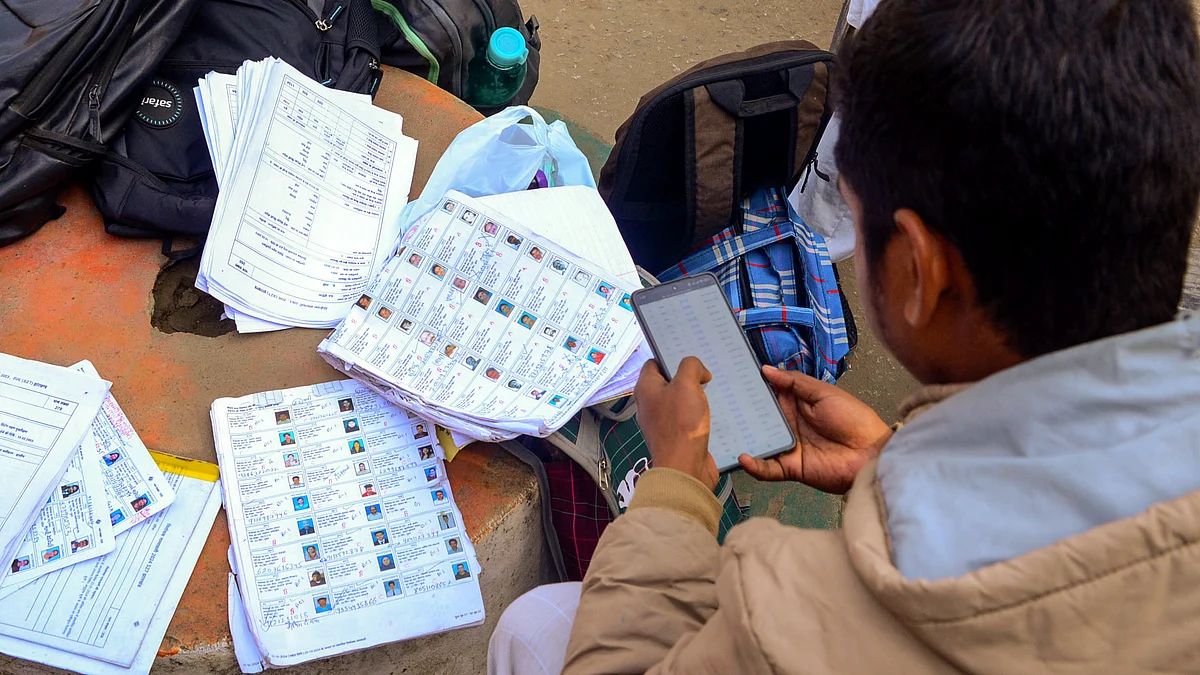 A voter checks his name in the voter list.