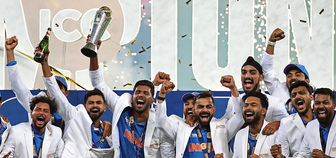 Victorious Indian team with the ICC Champions Trophy