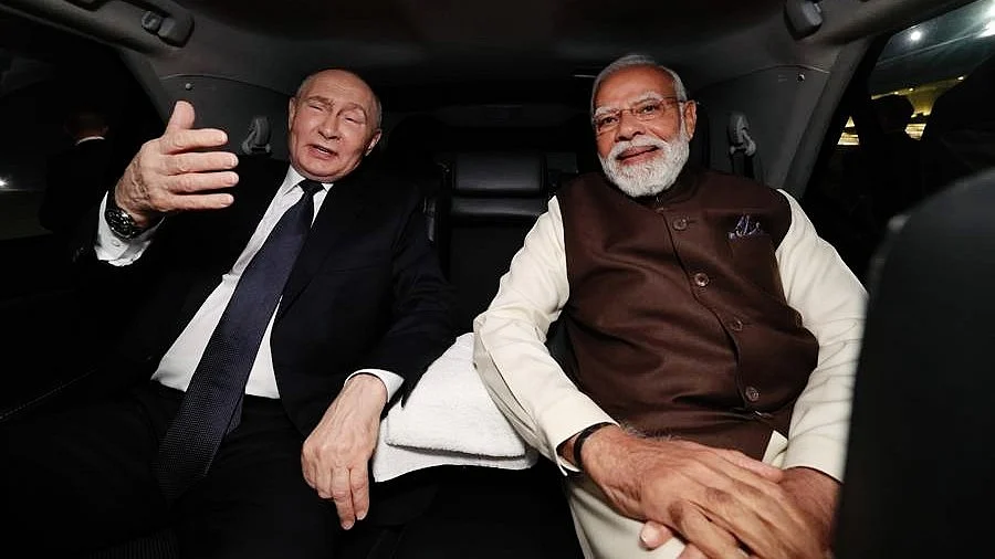 An honour? Vladimir Putin and Narendra Modi during the former's recent visit to India