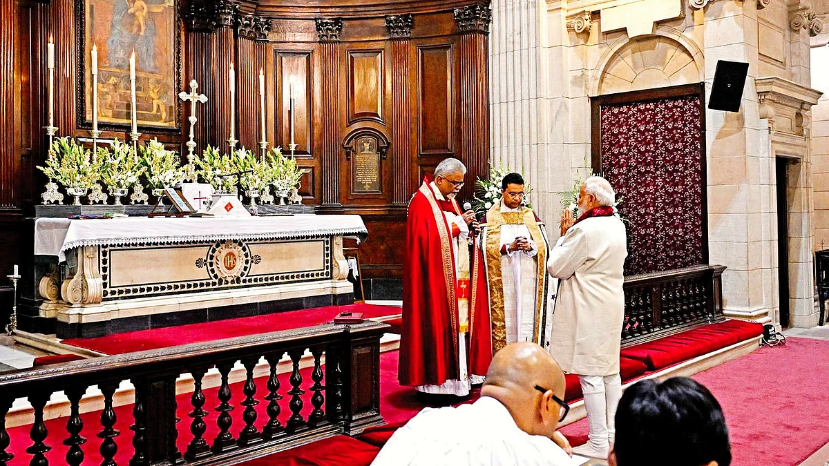 PM Narendra Modi joins a Christmas service