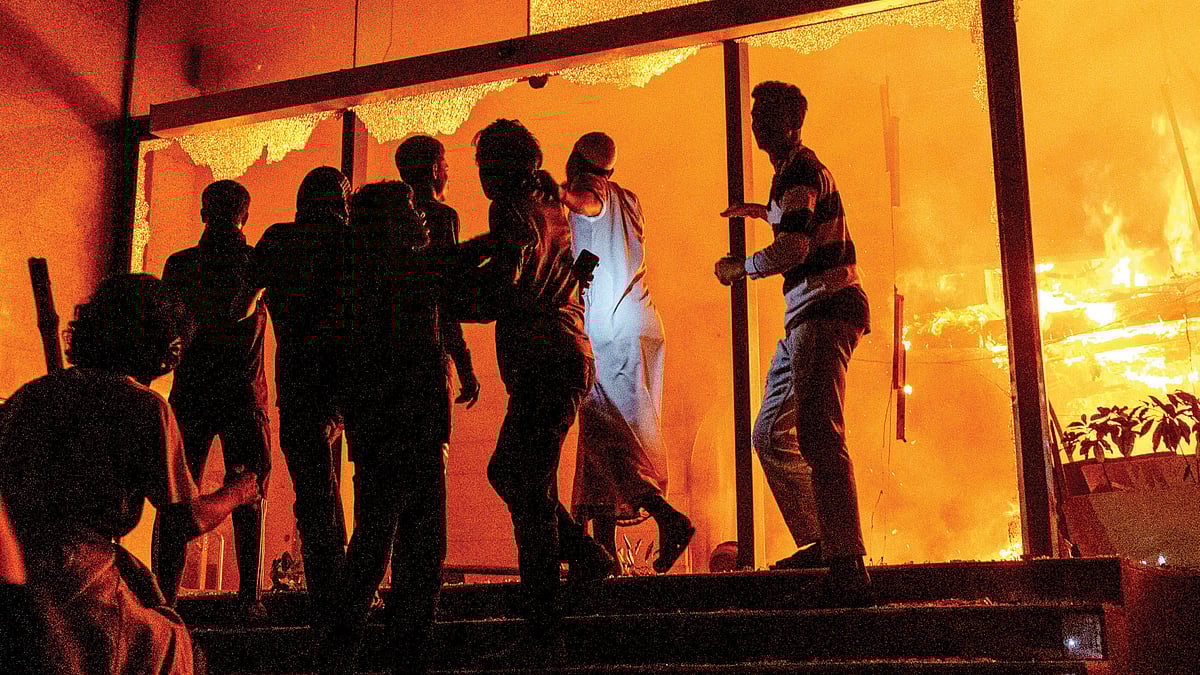 The Daily Star building in Dhaka in flames amid protests following news of the death of Sharif Osman Hadi