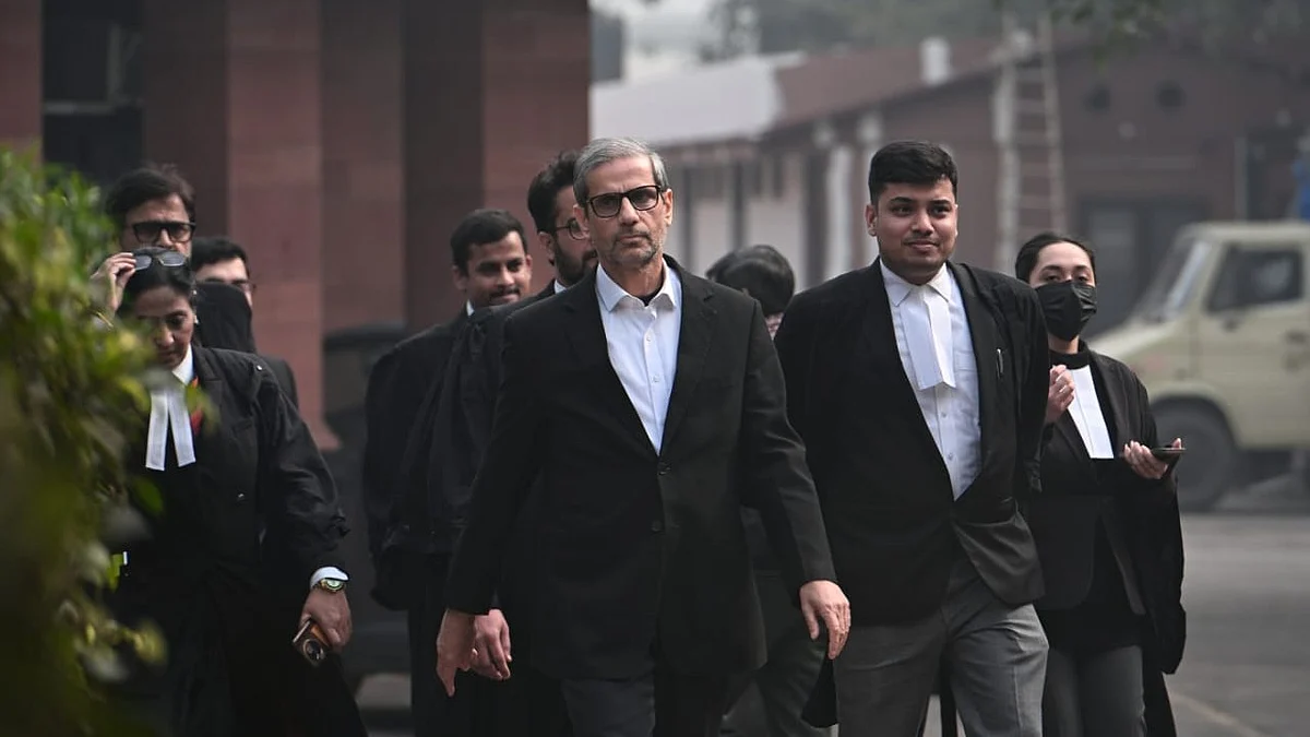 The Unnao rape survivor's lawyer Mehmood Pracha with his team after the SC verdict