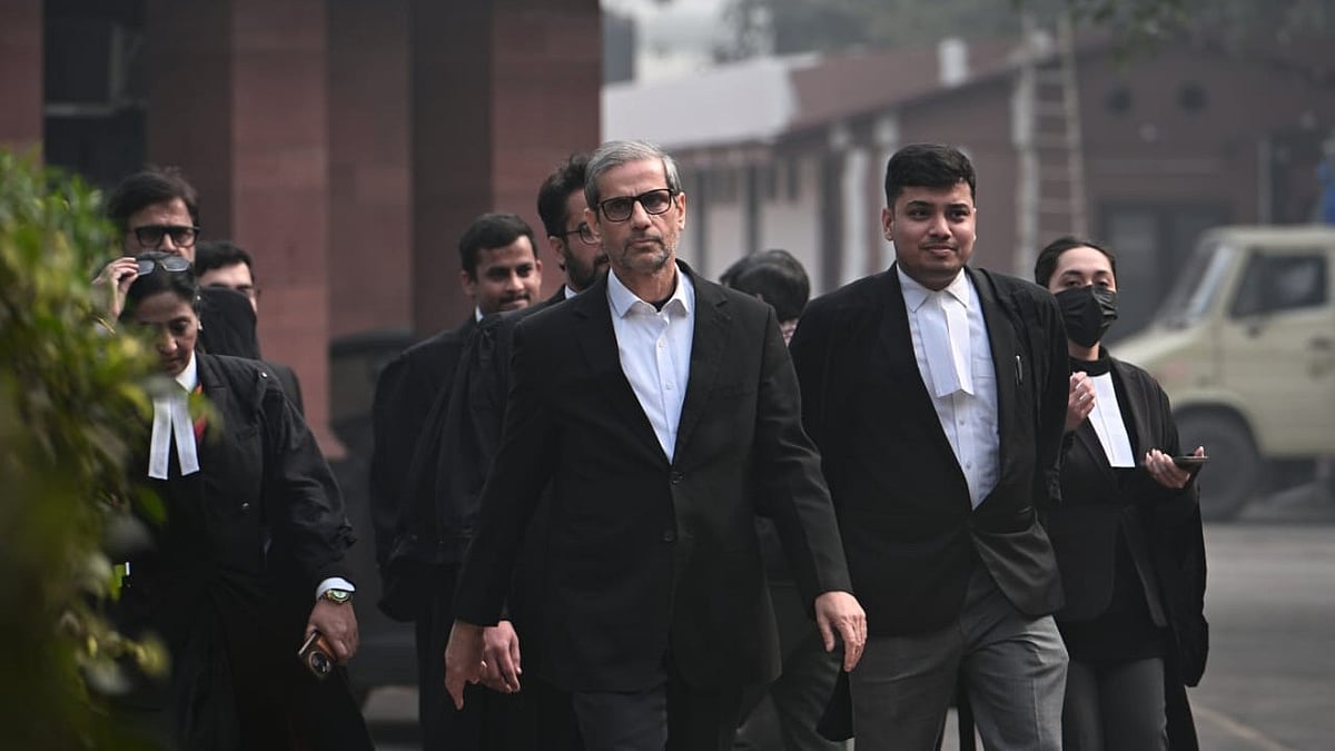 The Unnao rape survivor's lawyer Mehmood Pracha with his team after the SC verdict