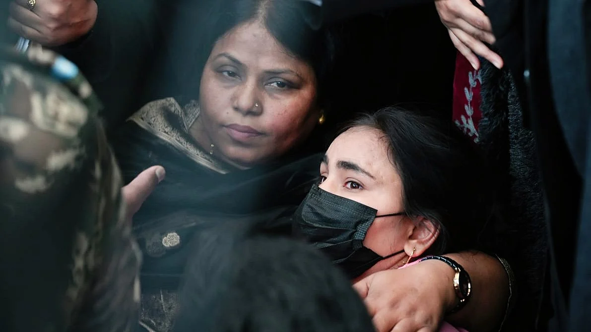 The survivor with her family at the Supreme Court premises