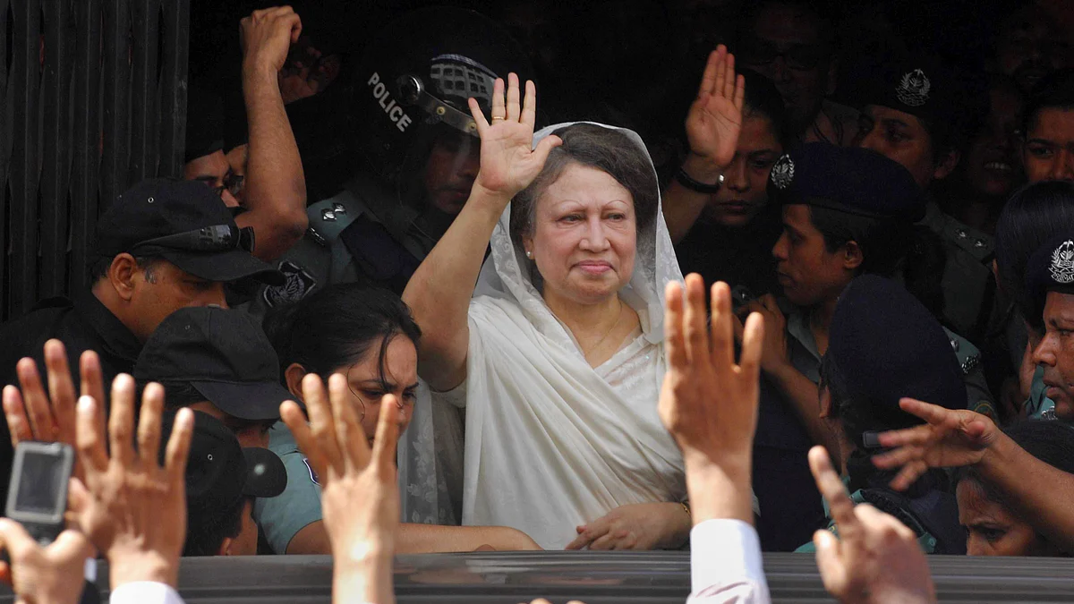 Khaleda Zia waves to supporters after she was arrested in Dhaka on 3 September 2007.