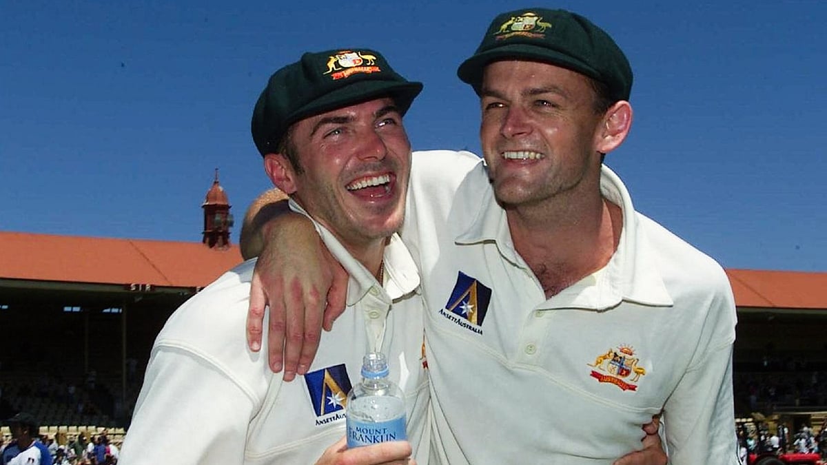 Damien Martyn (left) with Adam Gilchrist