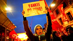 Protesters in Istanbul, Turkey raise slogans against the US military attack on Venezuela, 4 Jan