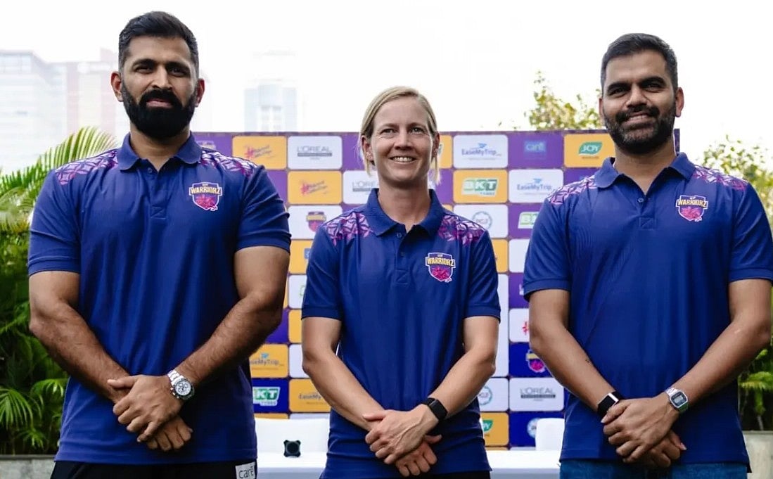 Abhishek Nayar (left) with Meg Lanning and UP Warriorz official