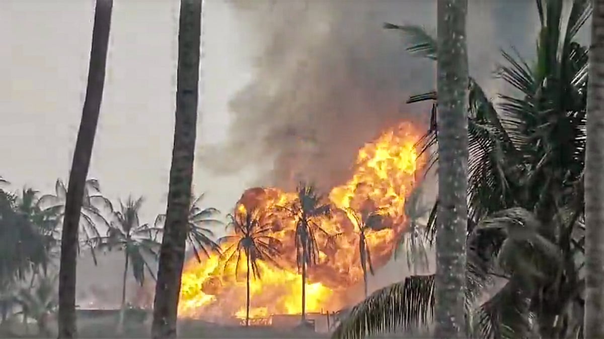 Smoke and flames rise after a gas leak at an ONGC well in Andhra Pradesh’s Konaseema district.