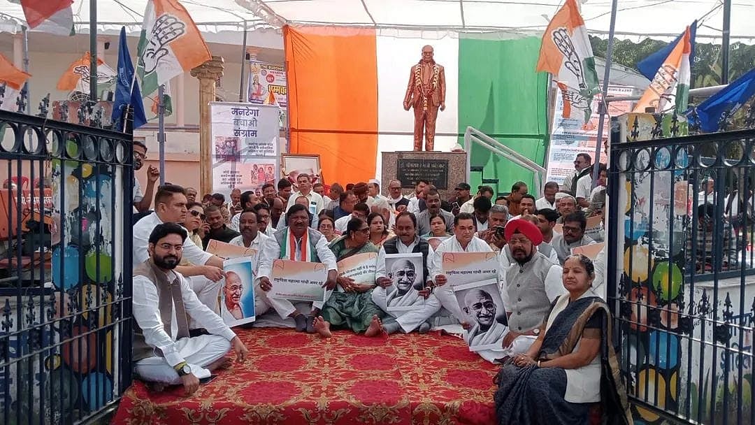 Congress workers protest against Modi government's anti-labour policies.