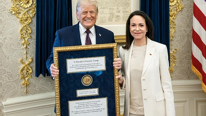 Venezuelan opposition leader María Corina Machado presents her Nobel Peace Prize to Donald Trump.