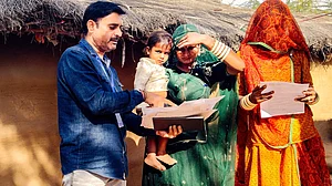 File photo of a BLO assisting voters with enumeration forms in Bikaner, Rajasthan