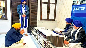 Punjab chief minister Bhagwant Singh Mann before Jathedar Giani Kuldeep Singh Gargaj