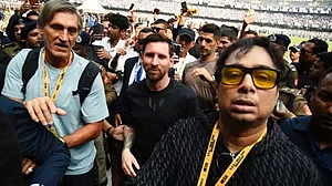 Satadru Dutta (forground) with Leo Messi at Salt Lake Stadium